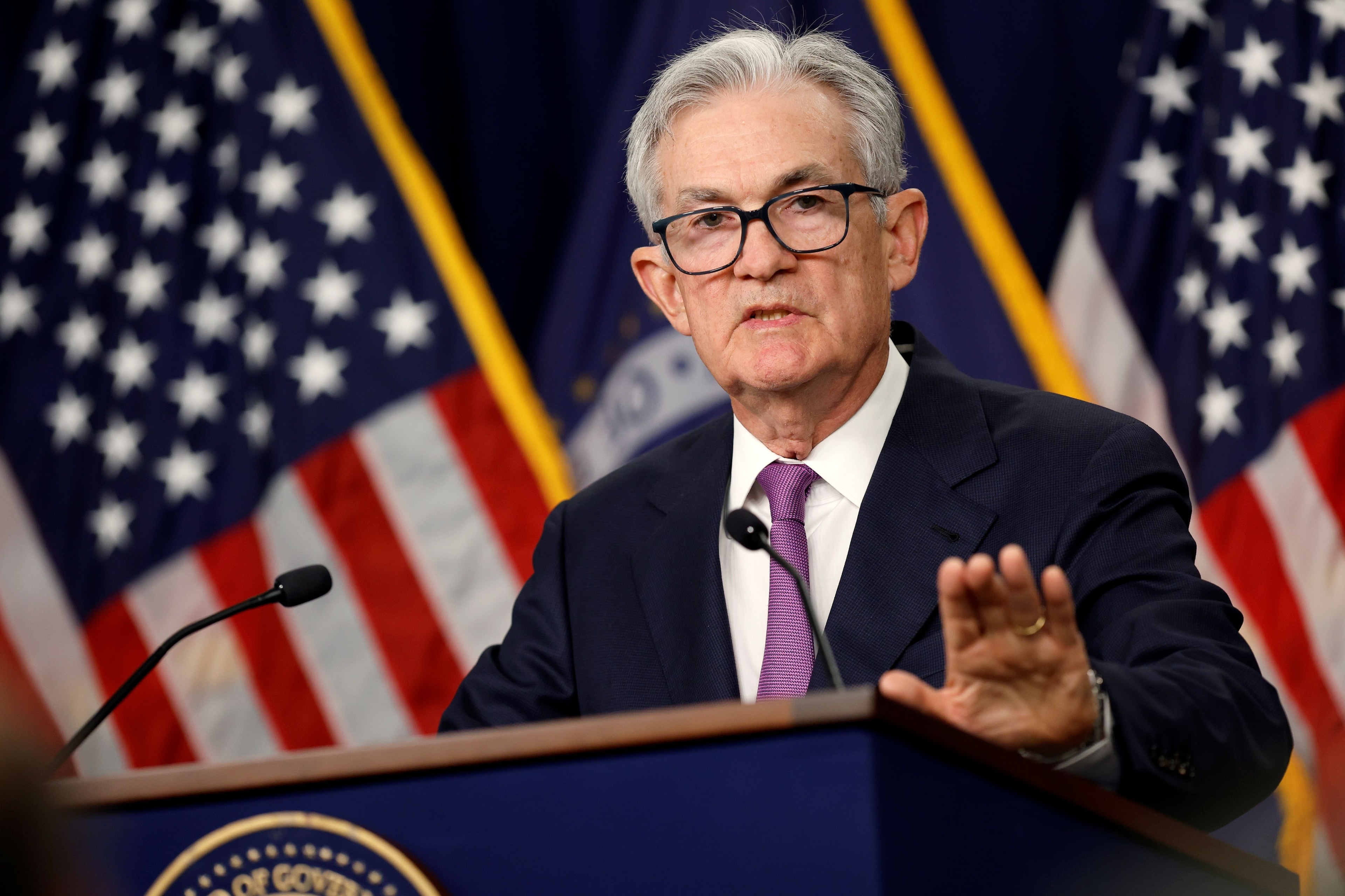 Wall Street retreats from all-time highs as Fed holds rates unchanged, Alphabet tumbles Hero