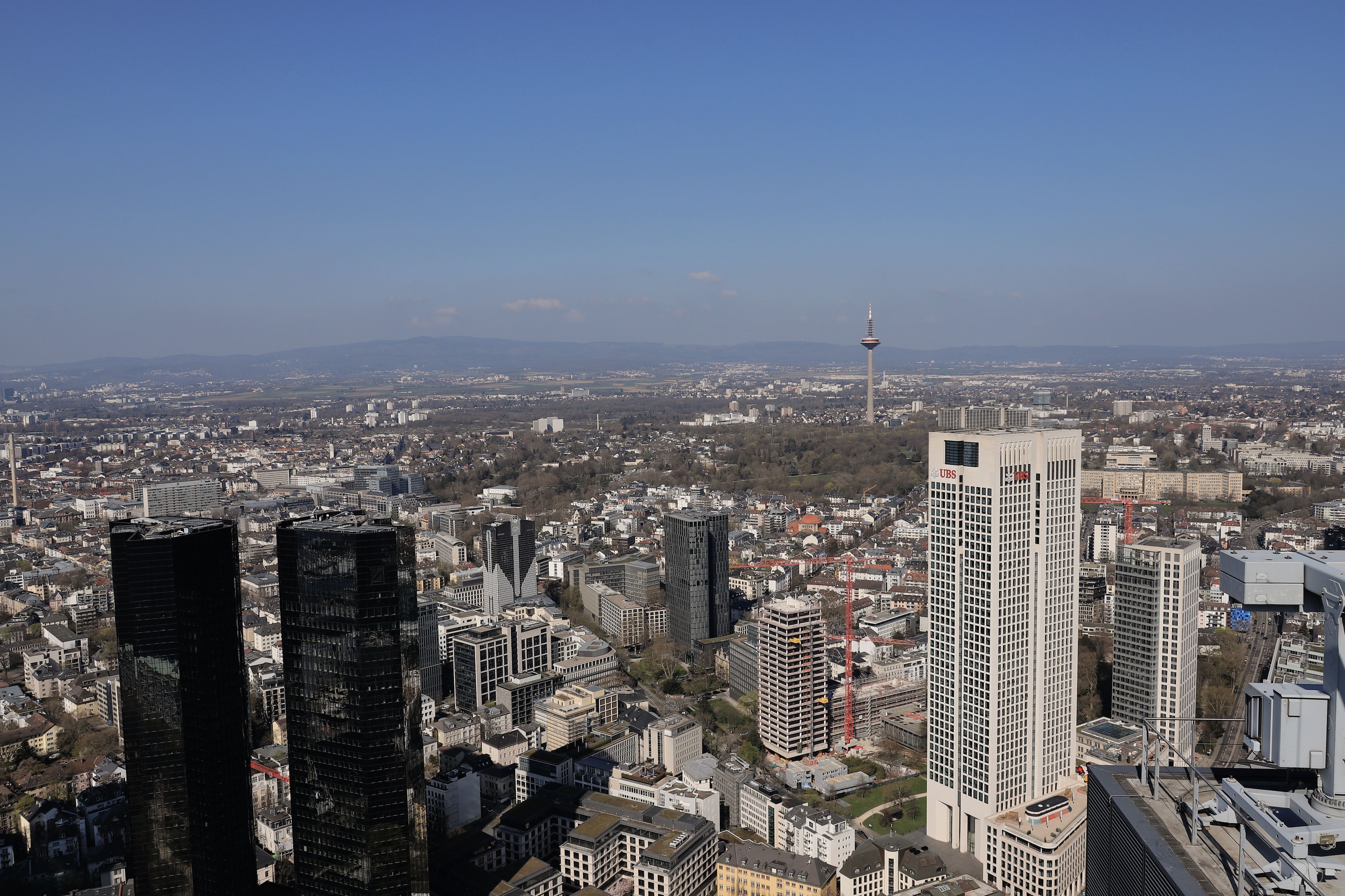Frankfurt in daylight. Photo: Christina & Peter / Pexels. Source: https://www.pexels.com/photo/frankfurt-skyline-with-skyscrapers-and-cityscape-36858885/ Licence: https://www.pexels.com/license/ No implied endorsement; no stock redistribution; no offensive portrayal of identifiable people.